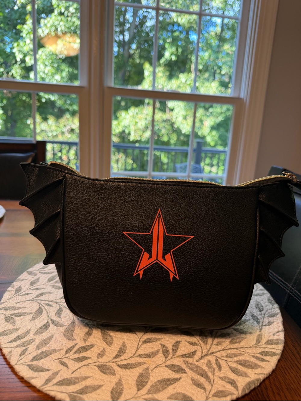 Jeffree Star Black Bag with Orange Star Emblem